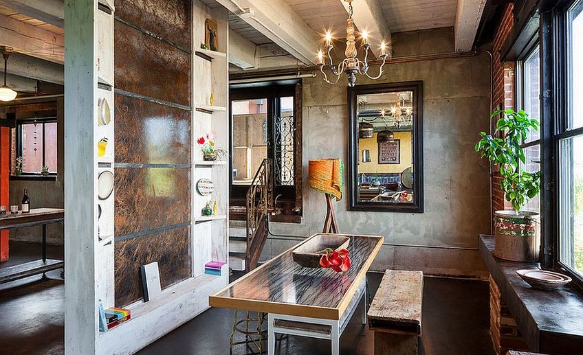 Custom crafted dining table steals the show in this loft dining room