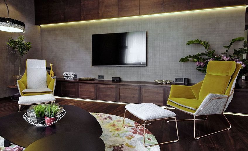 Usual wooden shelves above and below the tv in the gorgeous contemporary living room