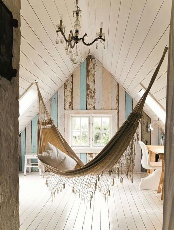 alluring brown white hammock interior design in attic bedroom with classic chandelier and study table on wooden floor idea